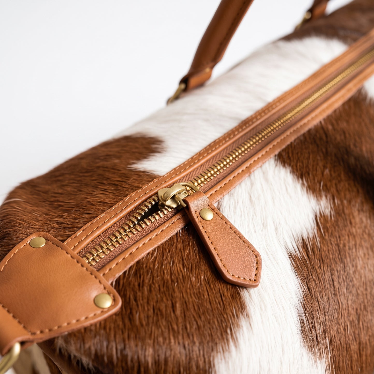 The Essaouira Weekender — Brown & White Cowhide Bag