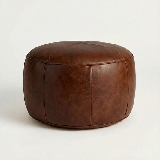 Brown leather ottoman on a white background
