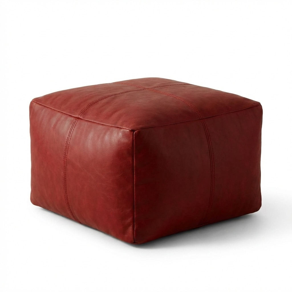 Red leather ottoman on a white background