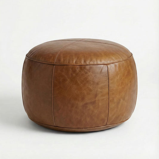 Brown leather ottoman on a white background
