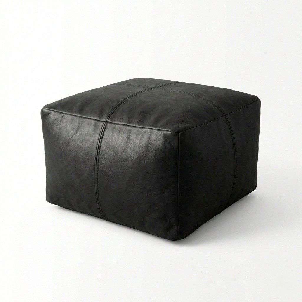 Black leather ottoman on a white background